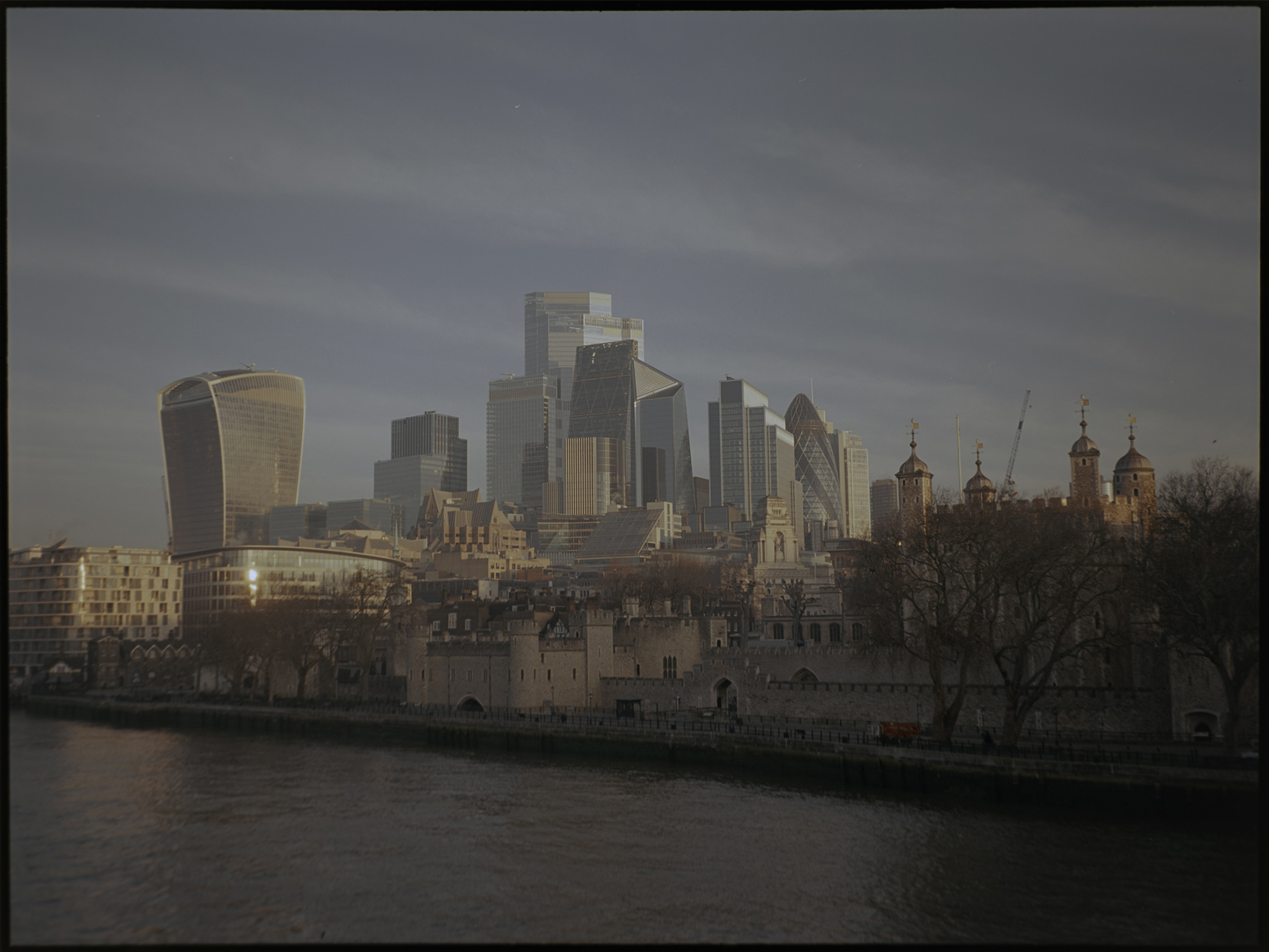 City of London skyline and Tower of London across the Thames — street photography on Kodak Ektar 100 by London photographer David McConaghy