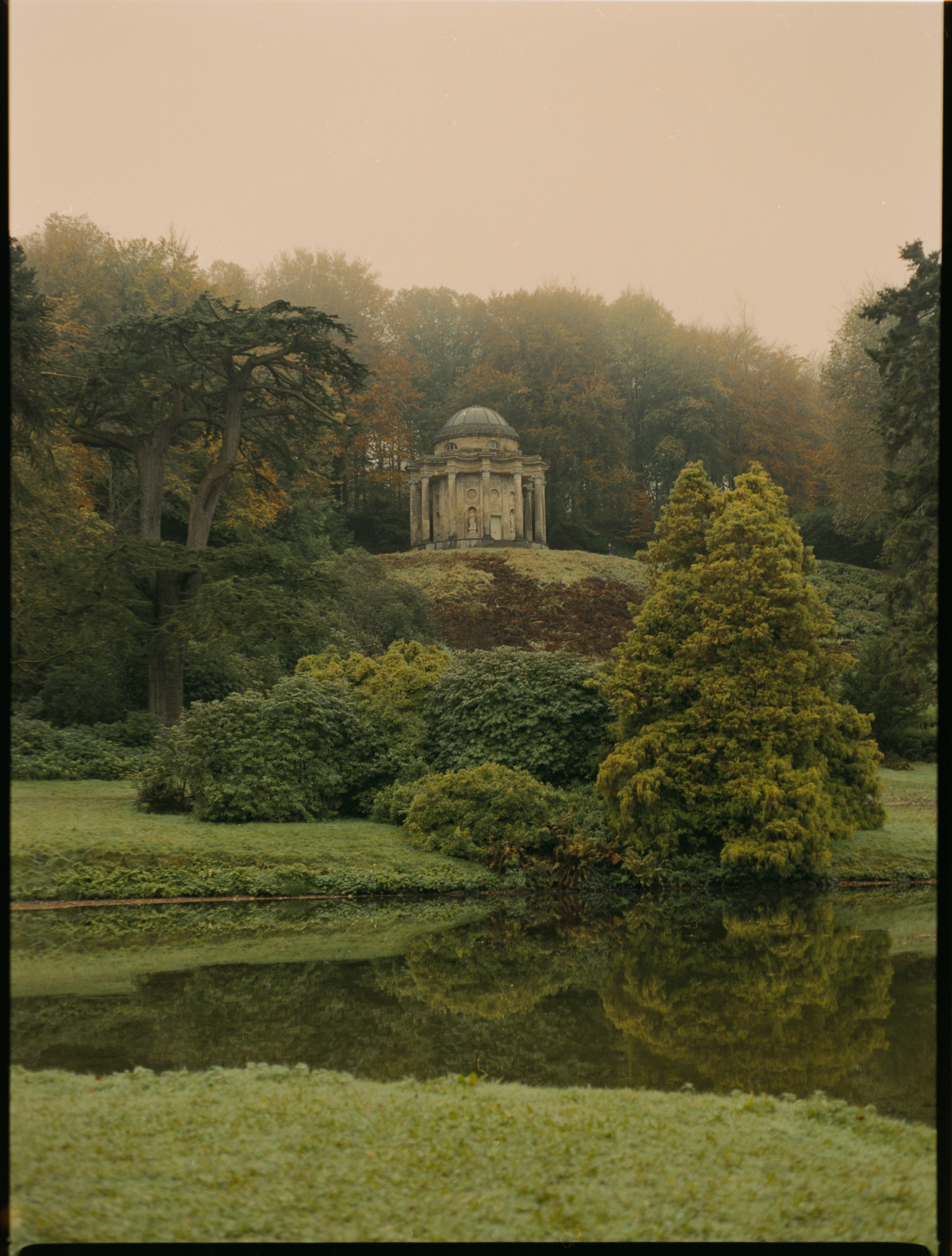 Stourhead gardens Wiltshire autumn — dreamy Cinestill 800 landscape photography