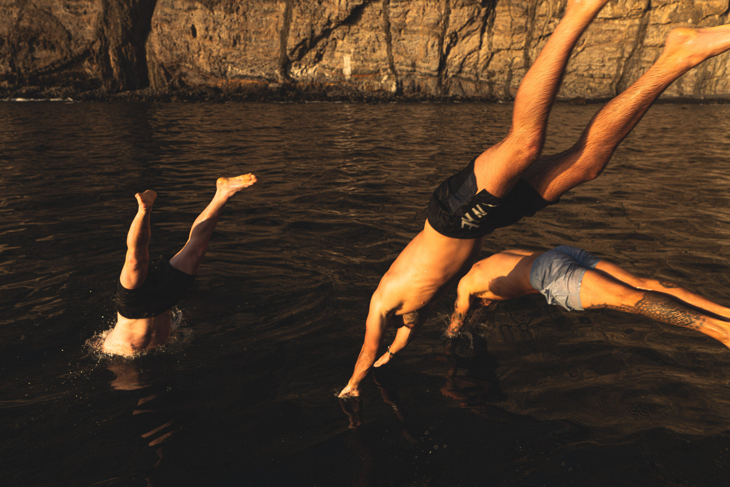 Cliff jumping golden hour adventure lifestyle photography