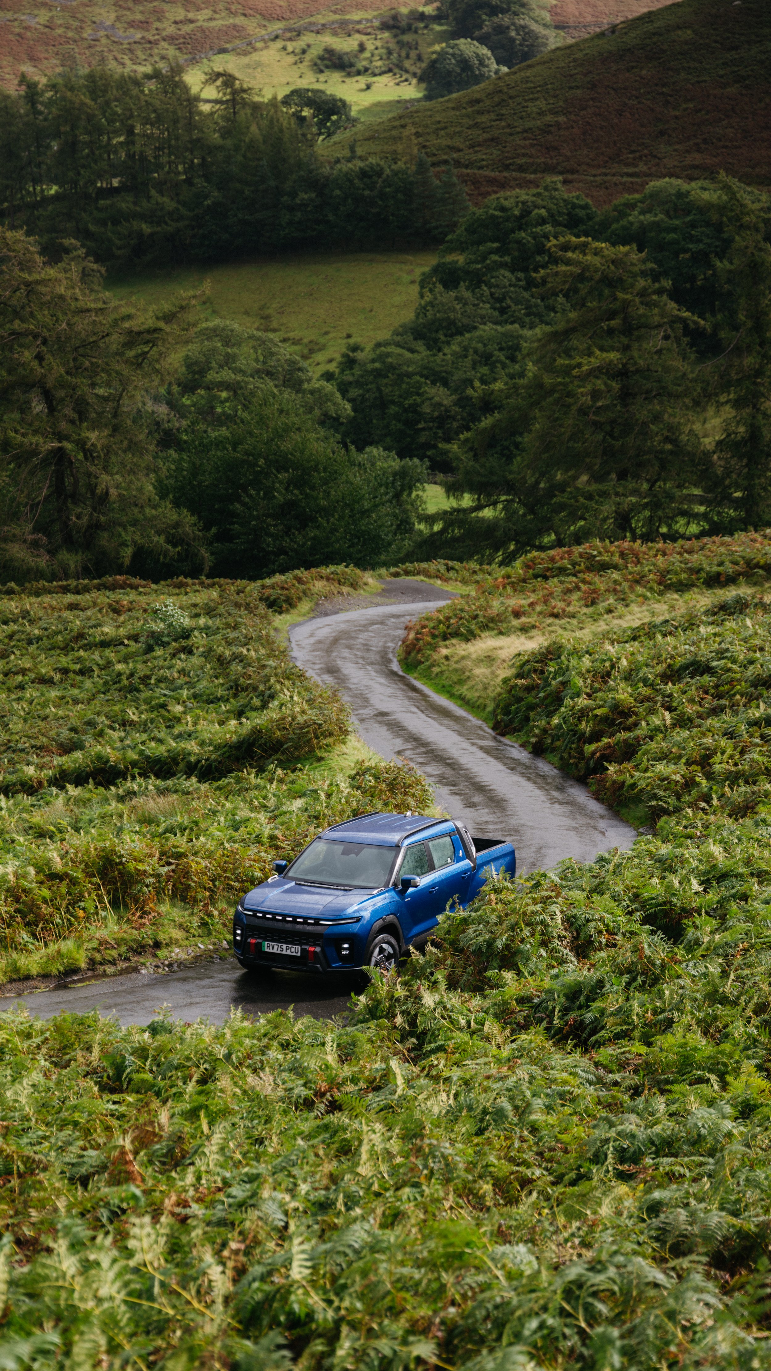 kgm electric suv mountain lake automotive photographer london