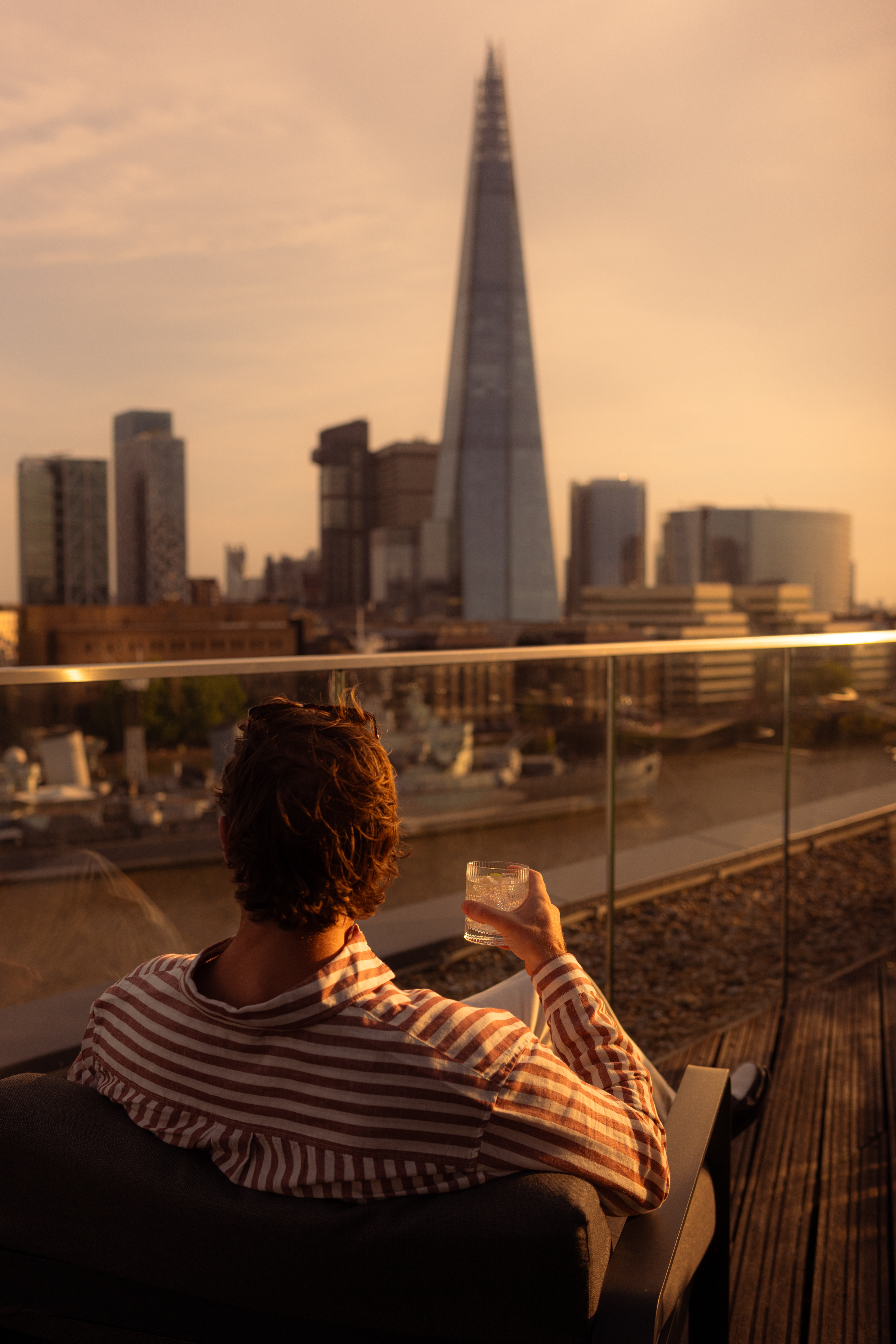 Cheval Three Quays — guest arrival lifestyle photography London serviced apartment