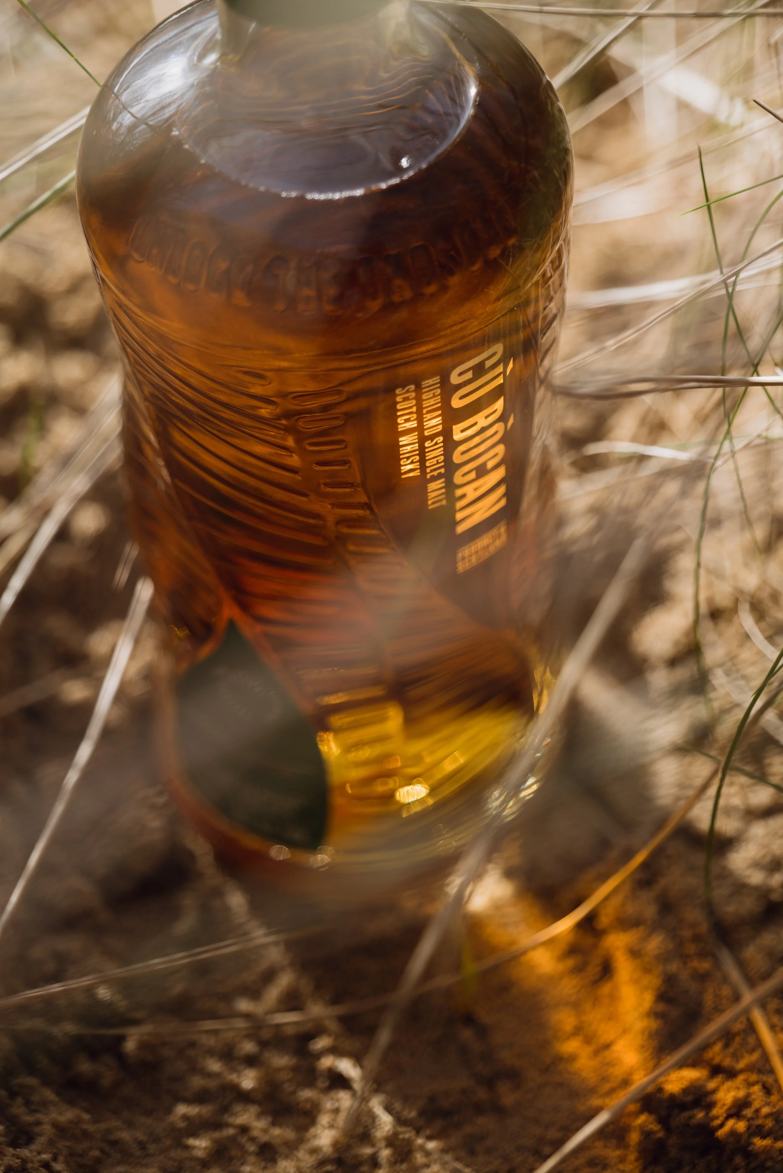 Cù Bòcan whisky lifestyle imagery Tomatin Distillery