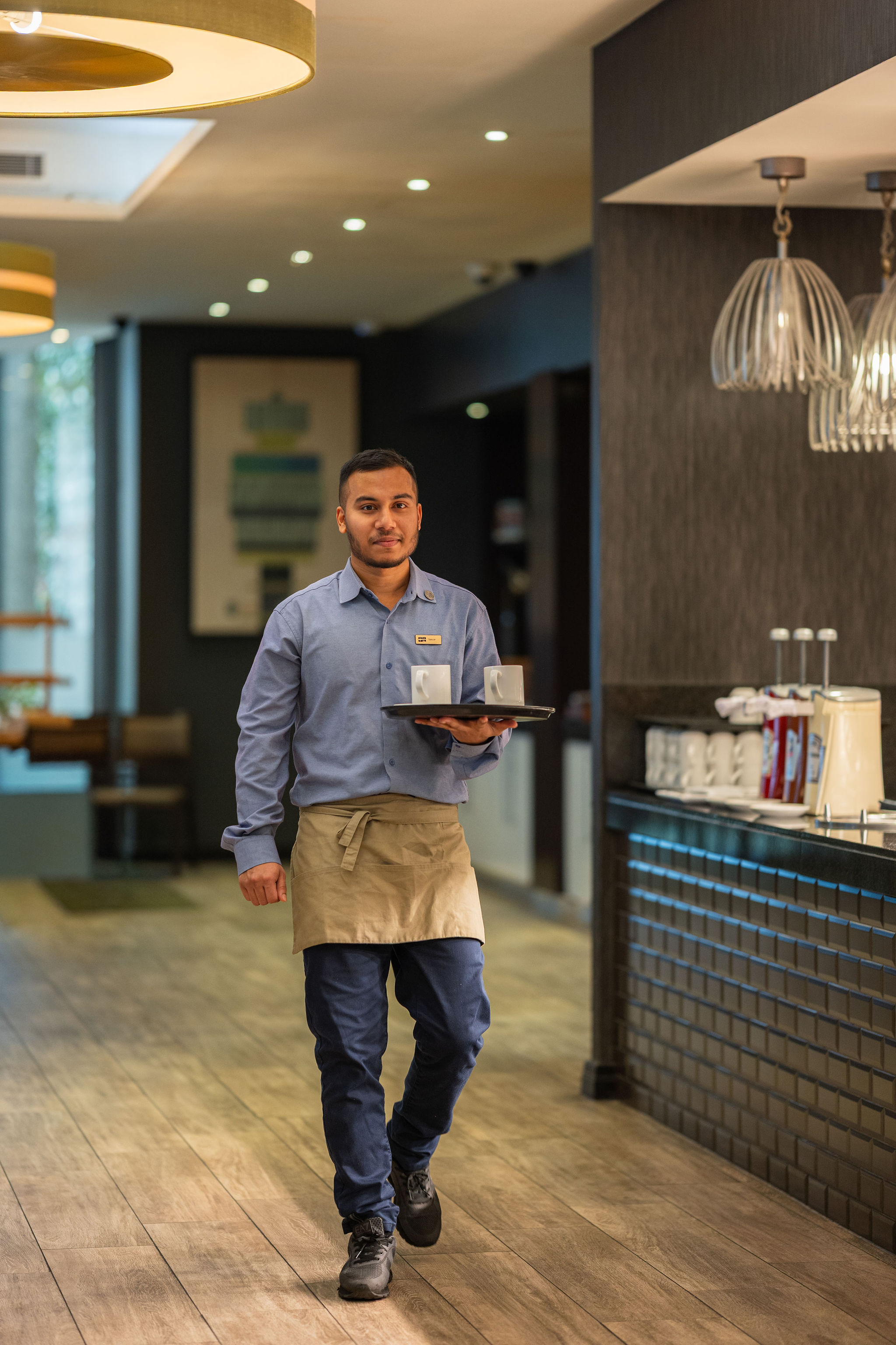 Hotel waiter staff portrait London