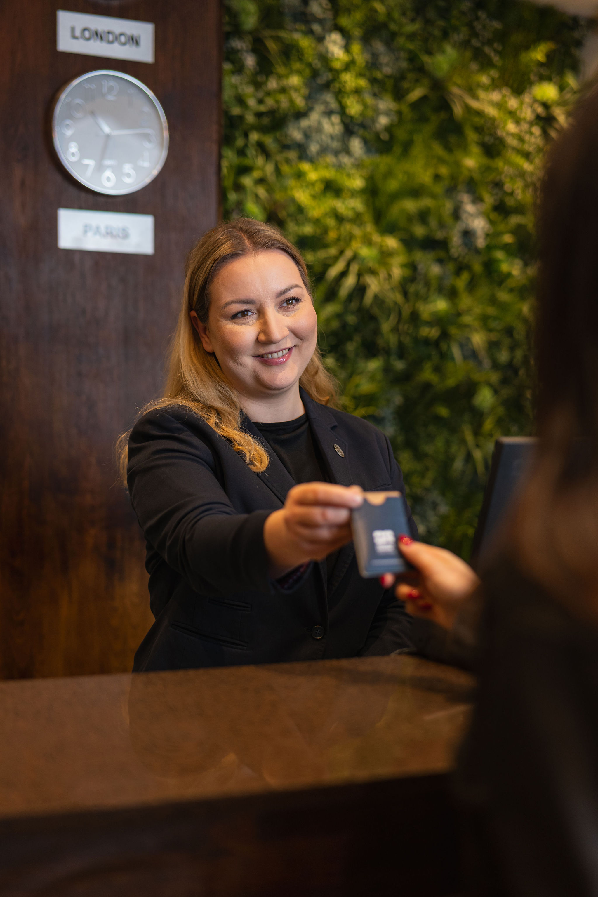 Hotel staff candid portrait workplace London