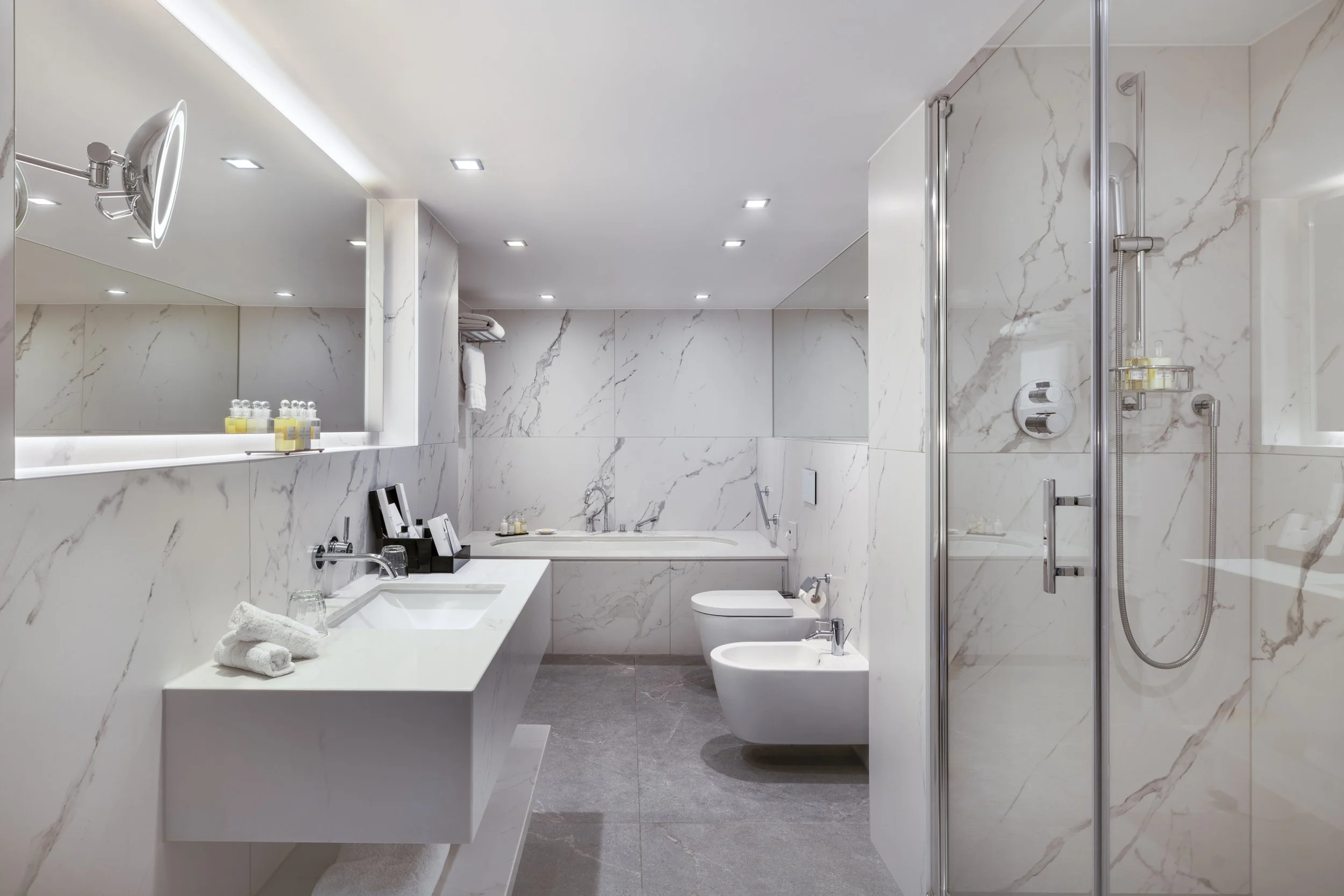 Royal Garden Hotel master suite bedroom interior photography